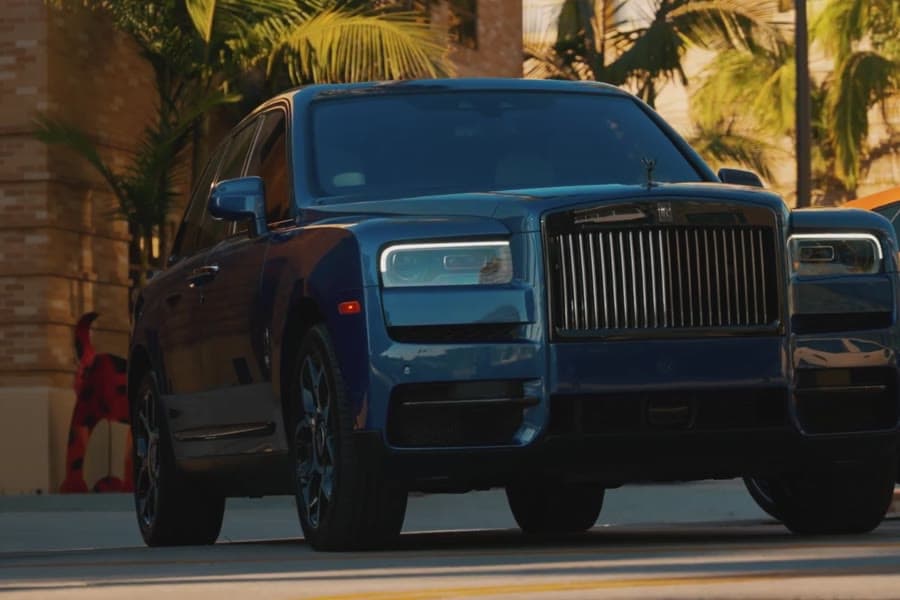 A Rolls-Royce Cullinan at golden hour